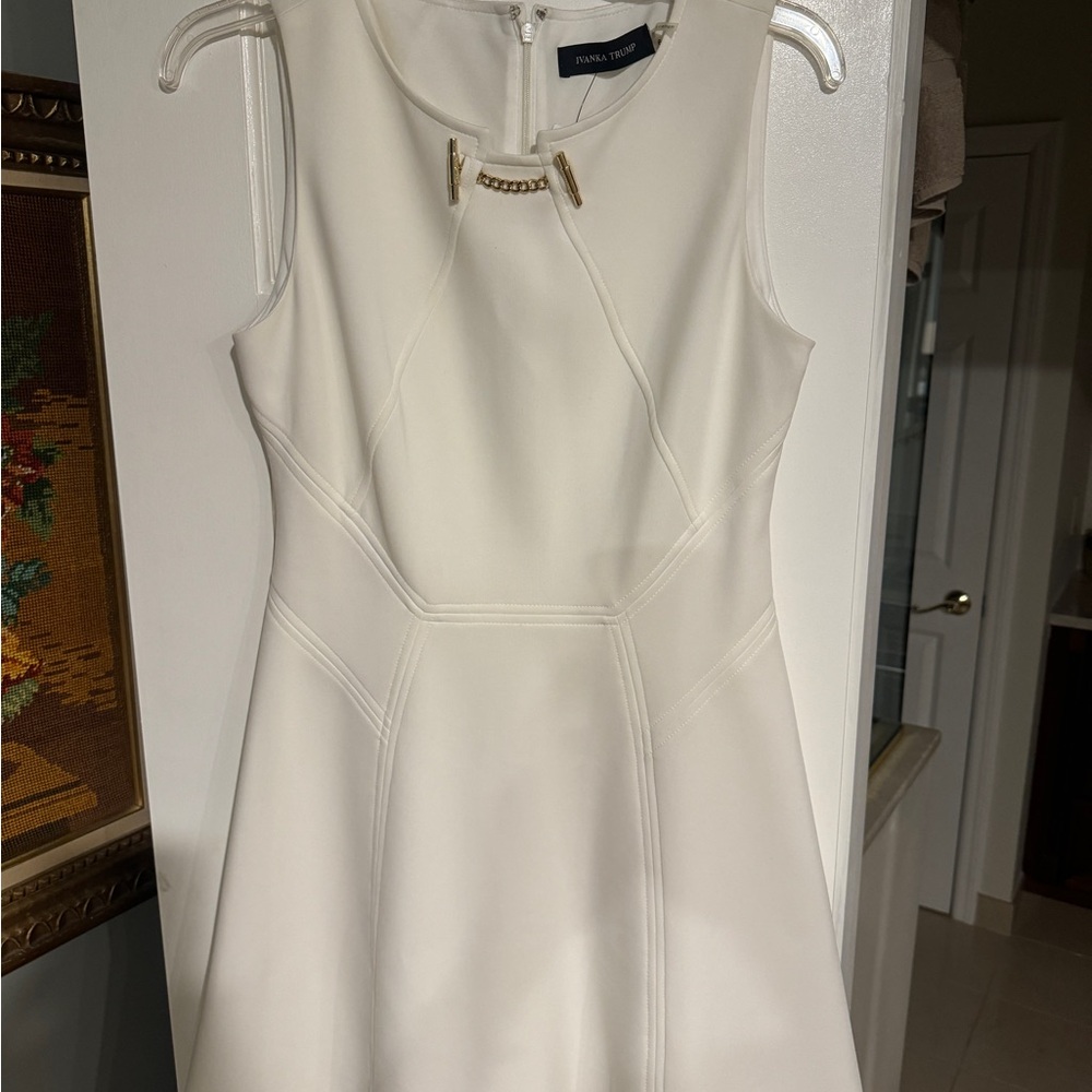 Ivanka trump beautiful winter white dress.